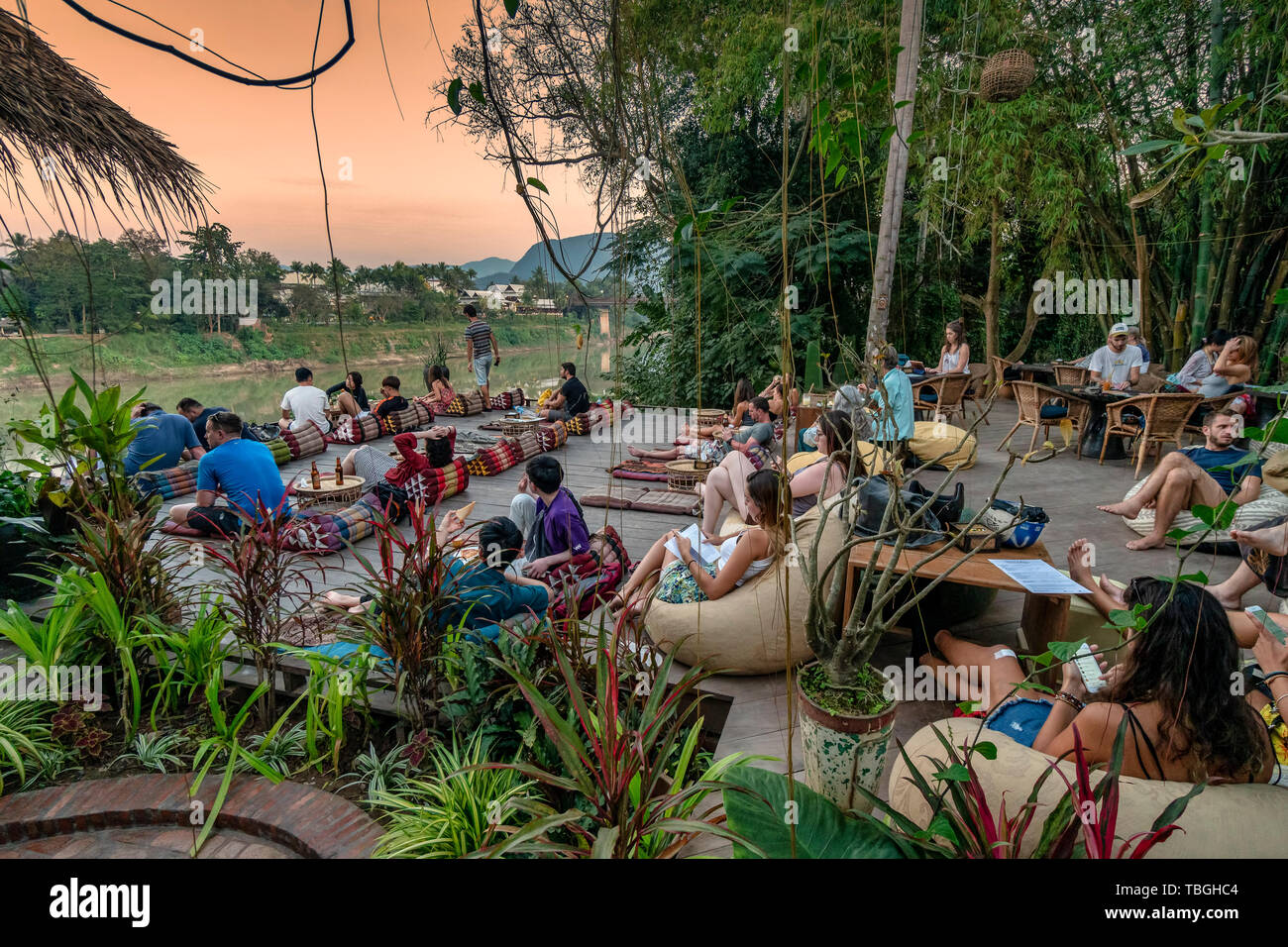 Popular Utopia bar and restaurant riverside Mekong River, Luang Prabang, Laos Stock Photo