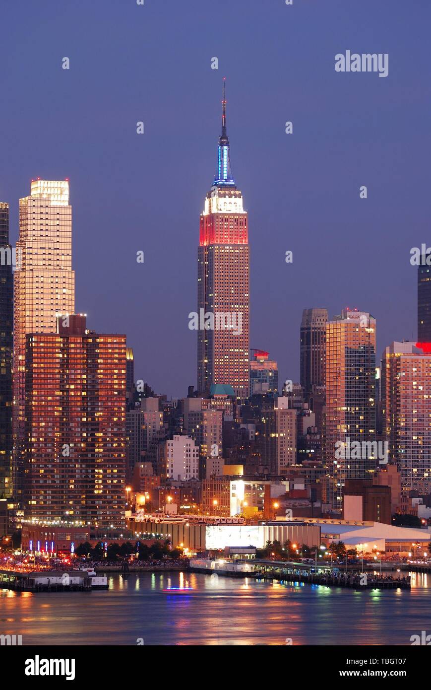 Empire State Building with New York City Manhattan skyline at dusk with ...