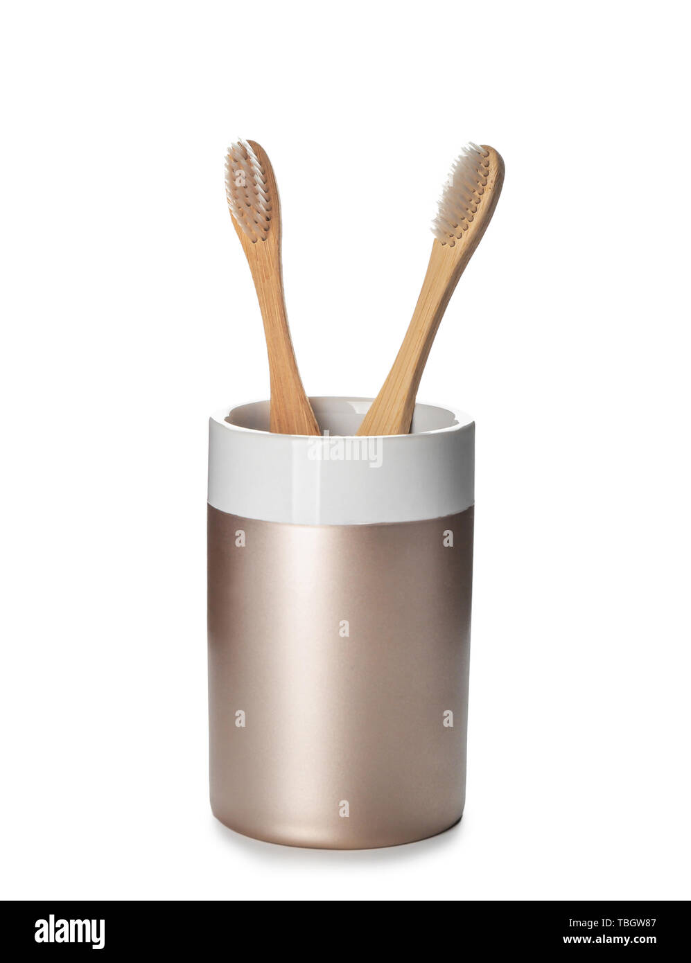 Holder with toothbrushes on white background Stock Photo - Alamy