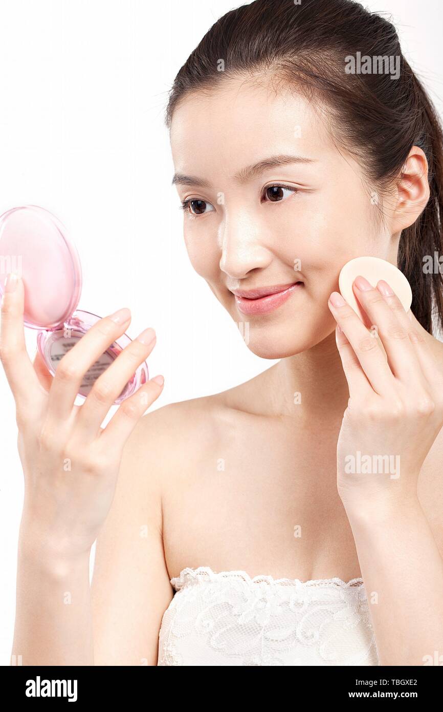 Young asian woman look mirror hi-res stock photography and images - Alamy