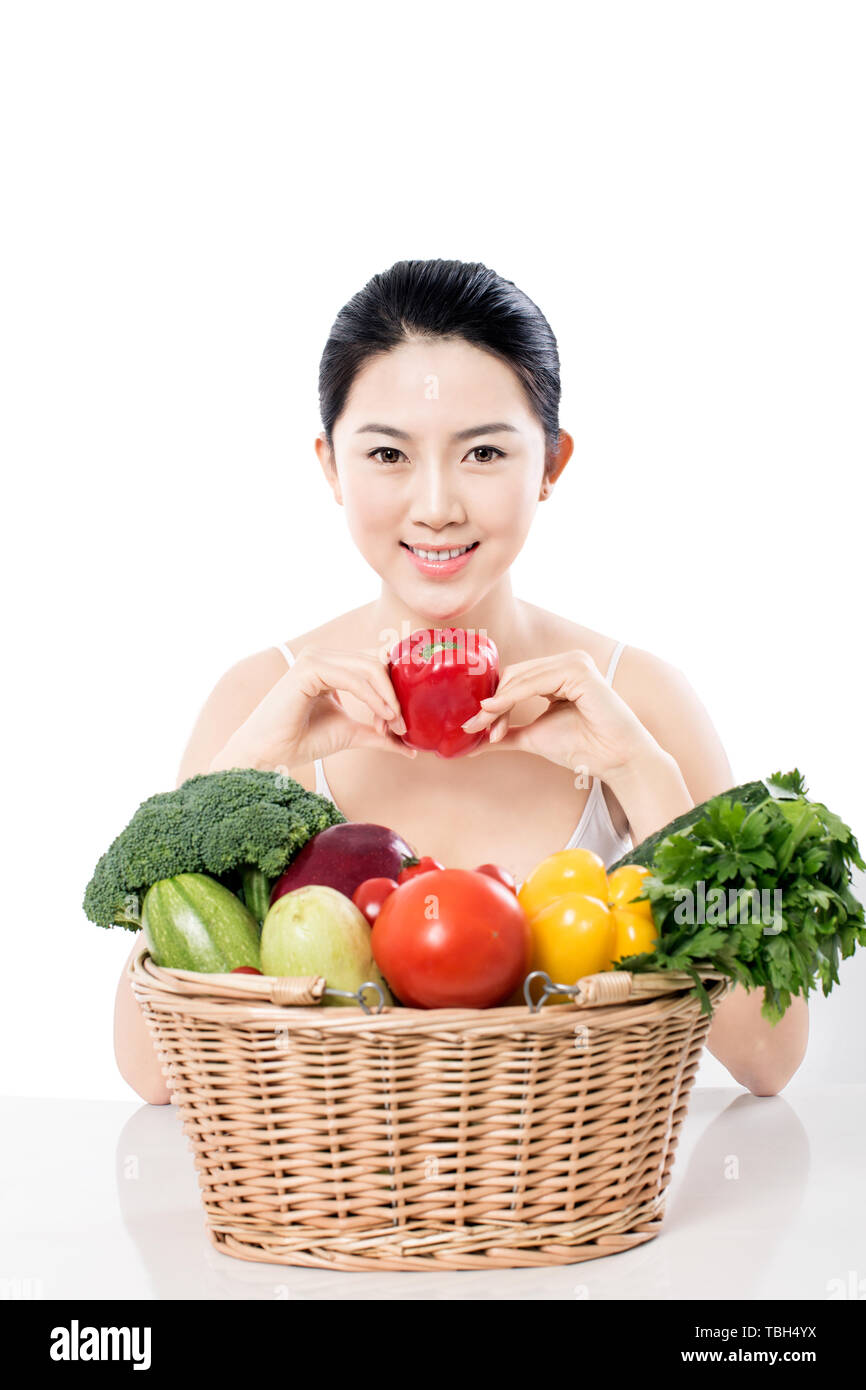 A girl with fresh fruits and vegetables Stock Photo Alamy