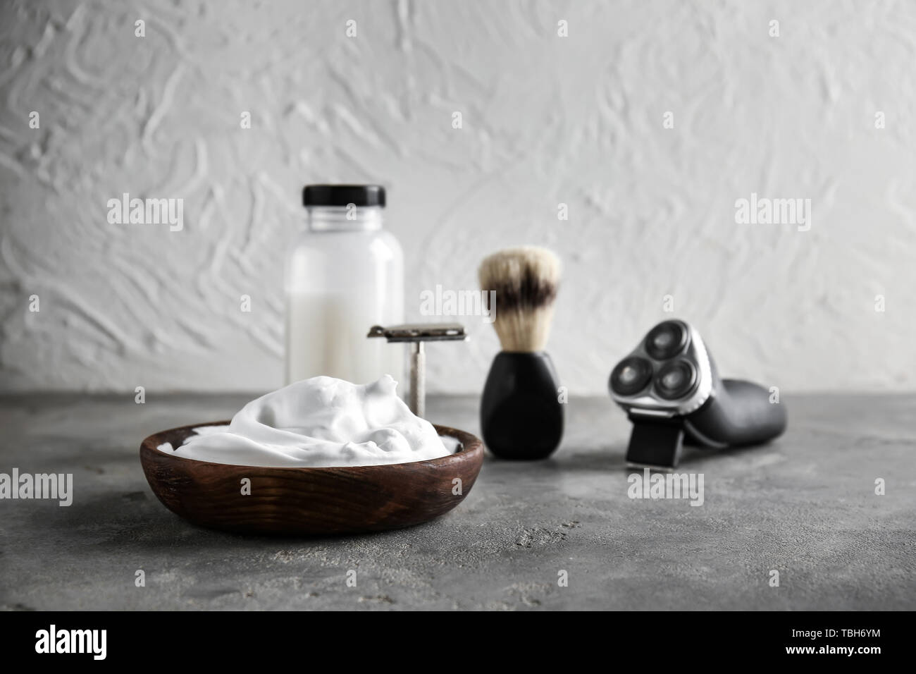 Set of male shaving accessories with foam on table Stock Photo - Alamy