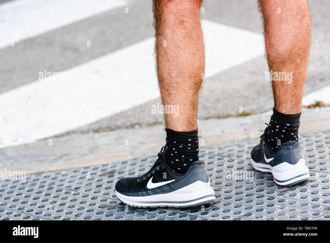 Valencia, Spain - May 28, 2019: A runner wearing a running shoe last model  of the american brand Nike Stock Photo - Alamy