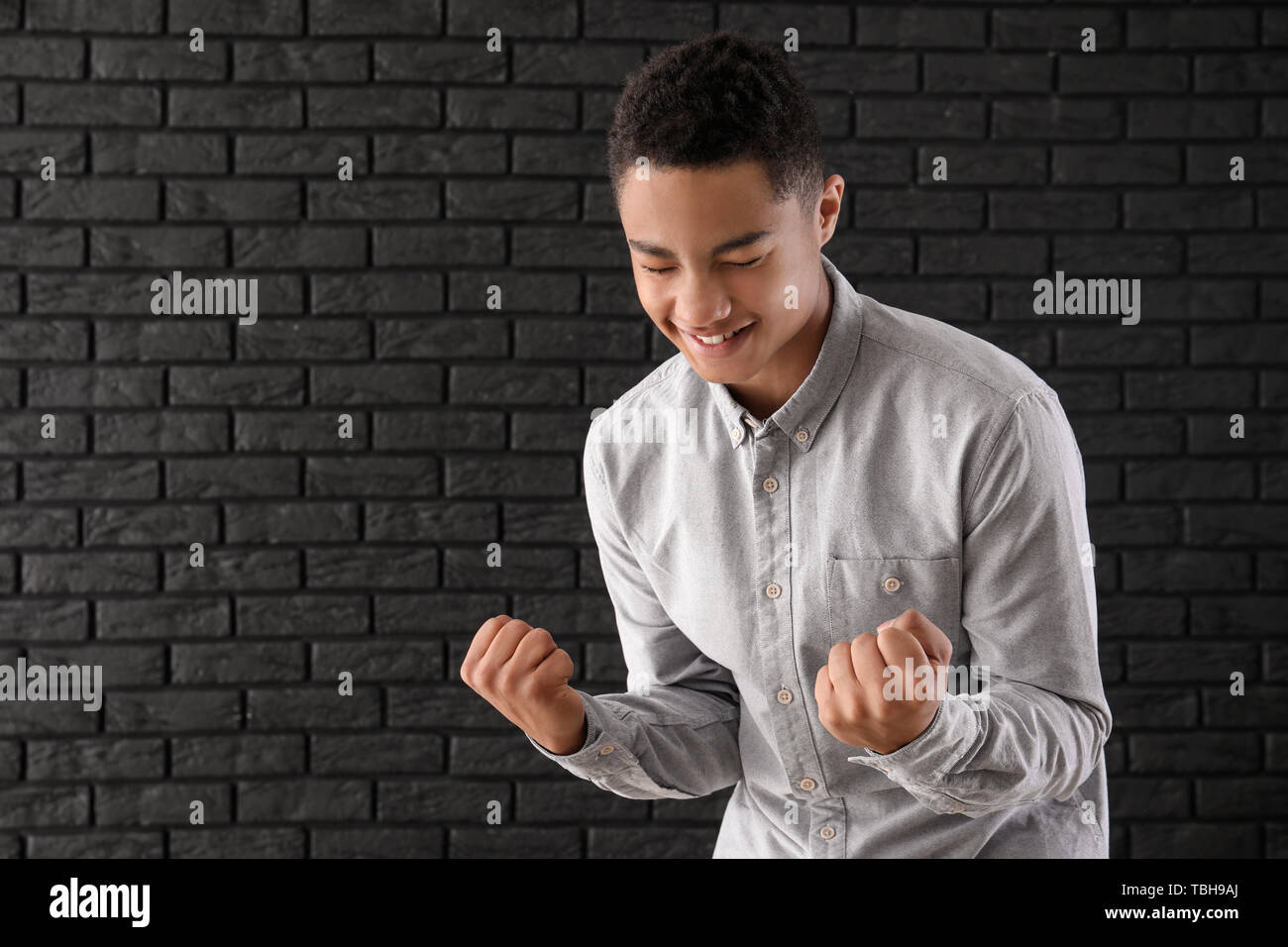 African teen boy portrait indoors hi-res stock photography and images ...