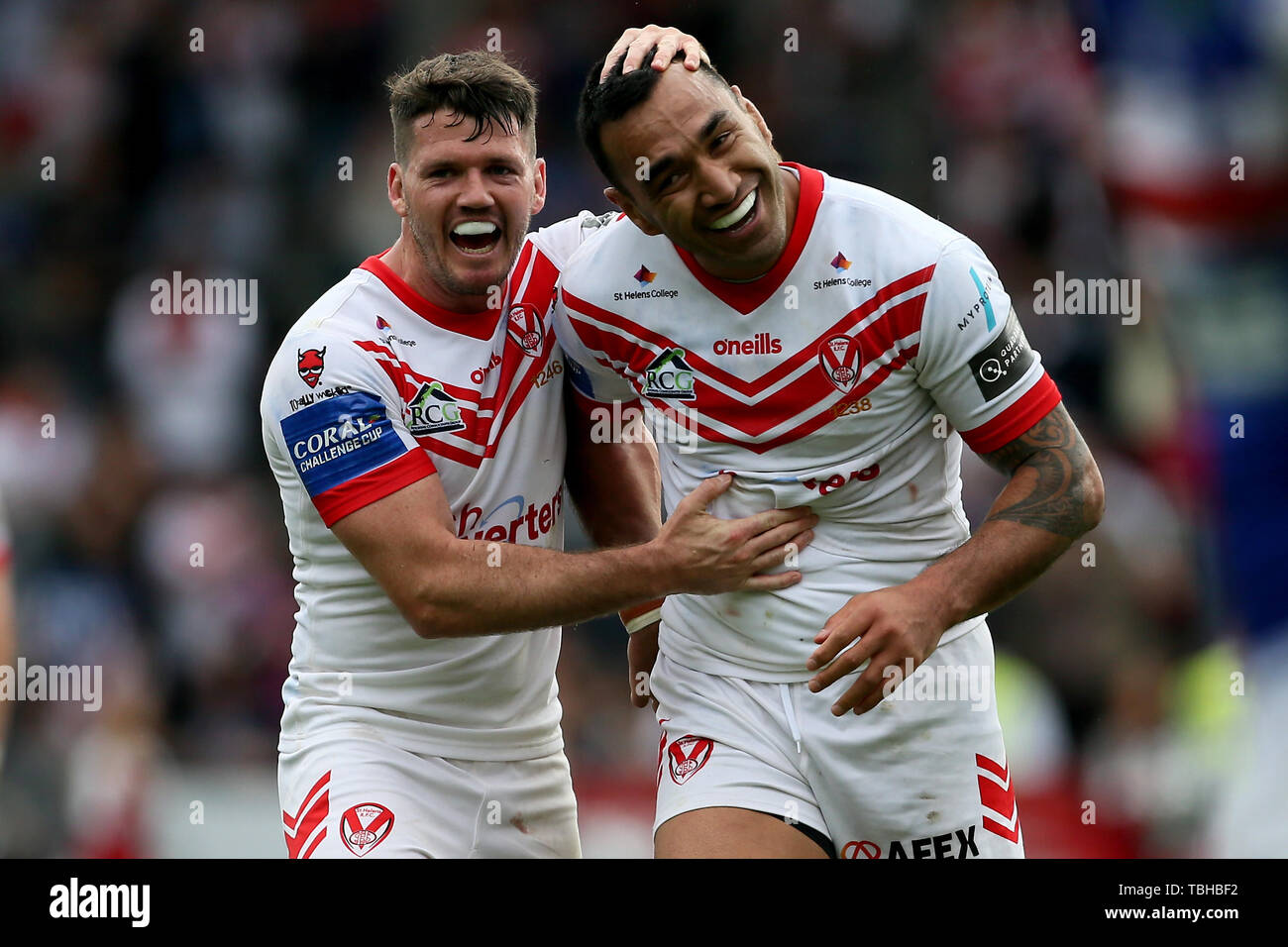 Saint Helens' Lachlan Coote celebrates with Saint Helens Zeb Taia during the Challenge Cup Quarter Final at the Totally Wicked Stadium, St Helens. Stock Photo