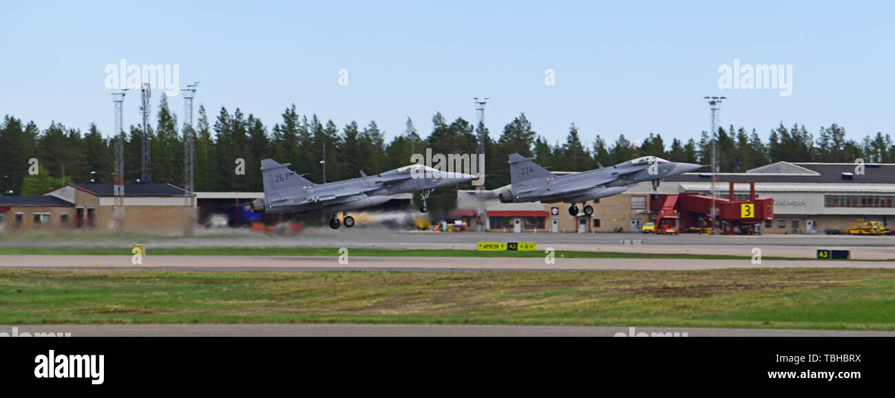 Swedish Air Force JAS 39 Gripens commence flight operations in support of Arctic Challenge Exercise 2019 at Kallax Air Base, Luleå, Sweden, May 30, 2019. ACE 19 is a Nordic aviation exercise that provides realistic, scenario-based training to prepare forces for enemy defensive systems. U.S. forces are engaged, postured and ready to deter and defend in an increasingly complex security environment. (U.S. Navy Photo by Chief Mass Communication Specialist John M. Hageman) Stock Photo