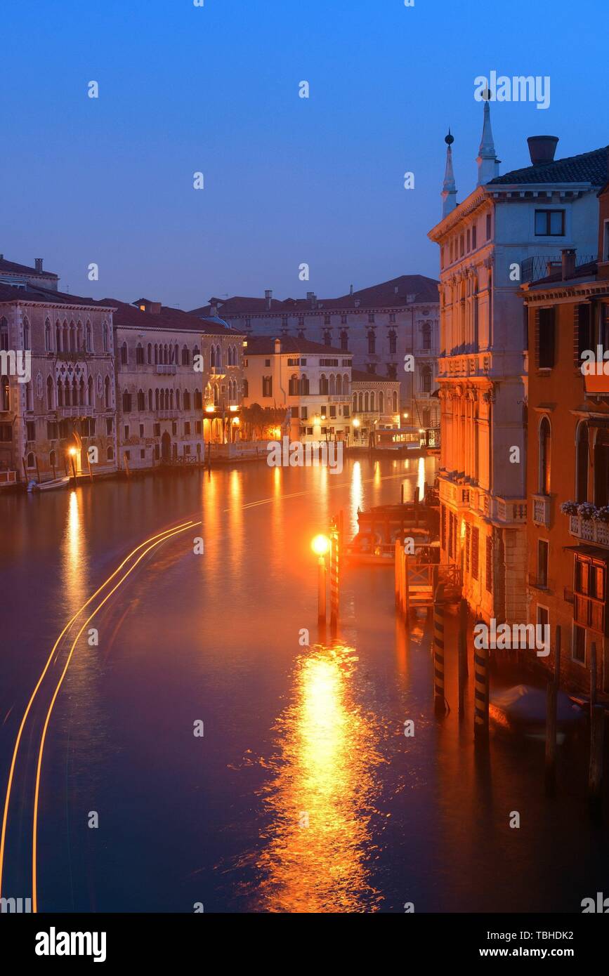 Venice canal view at night with historical buildings. Italy Stock Photo ...