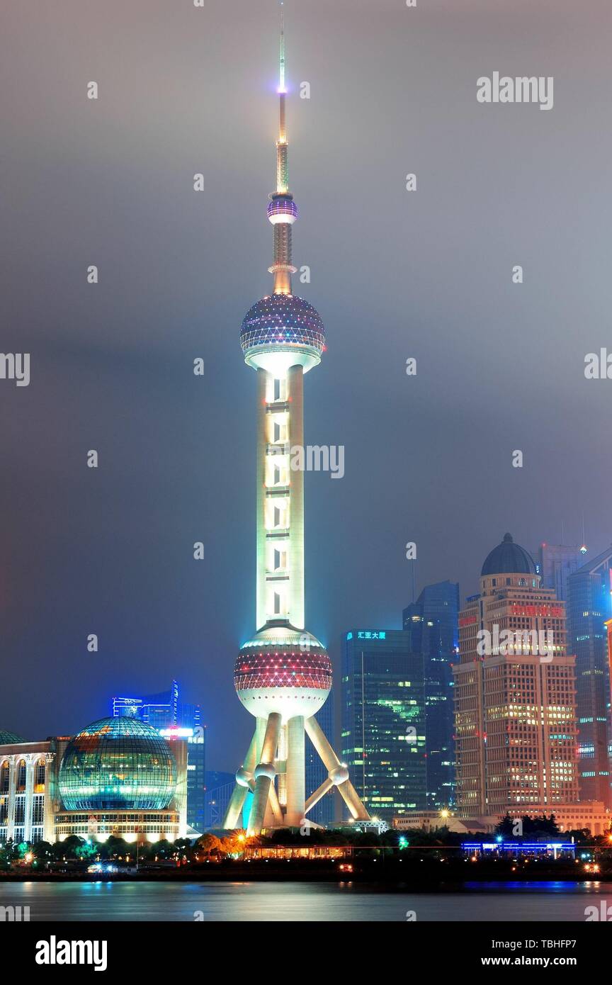 SHANGHAI, CHINA - MAY 28: Oriental Pearl Tower over river on May 28, 2012 in Shanghai, China. The tower was the tallest structure in China excluding Taiwan from 1994–2007 and the landmark of Shanghai. Stock Photo