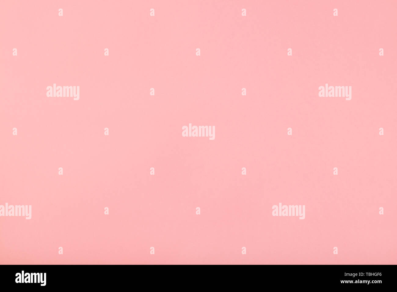 Pastel pink paper background with high resolution. Top view. Copy space