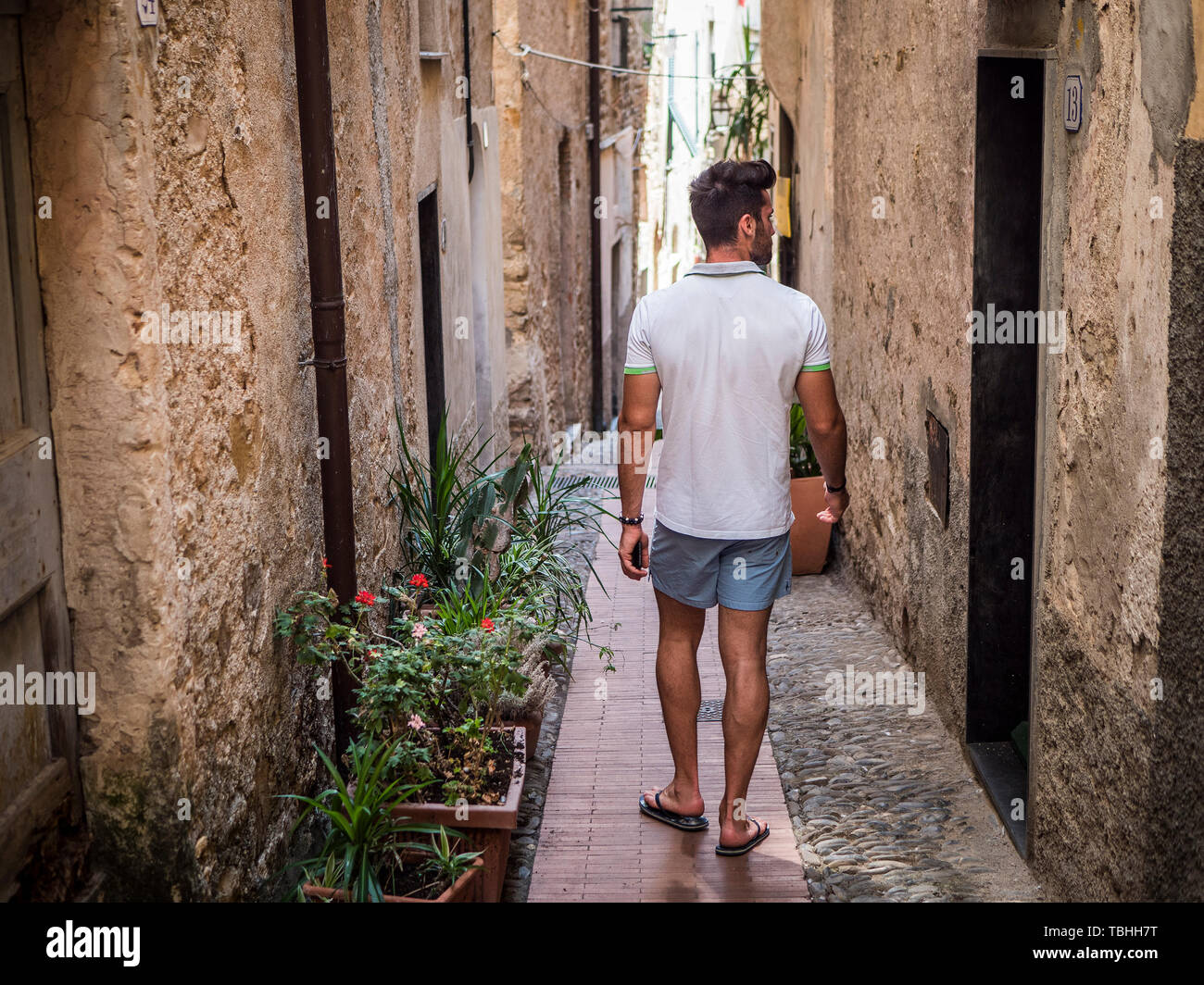 Fit young man walking alone hi-res stock photography and images - Alamy