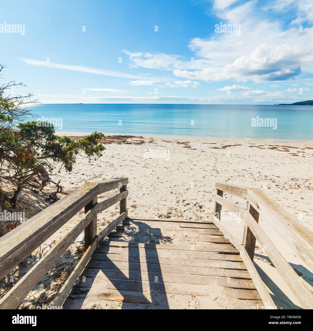 wooden-boardwalk-in-maria-pia-beach-alghero-sardinia-italy-stock