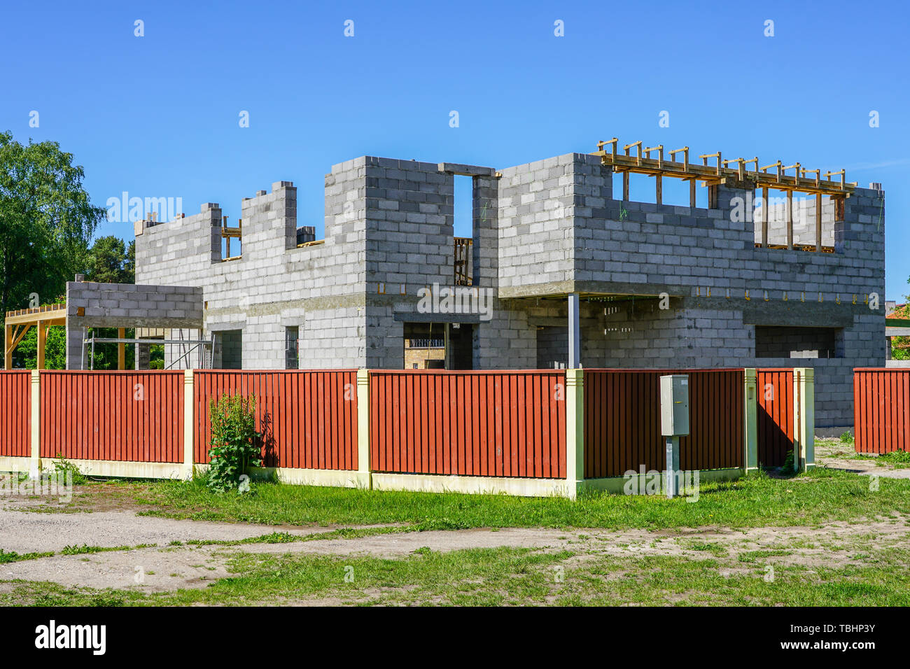 Concrete foundation and wall construction of a new house, view of