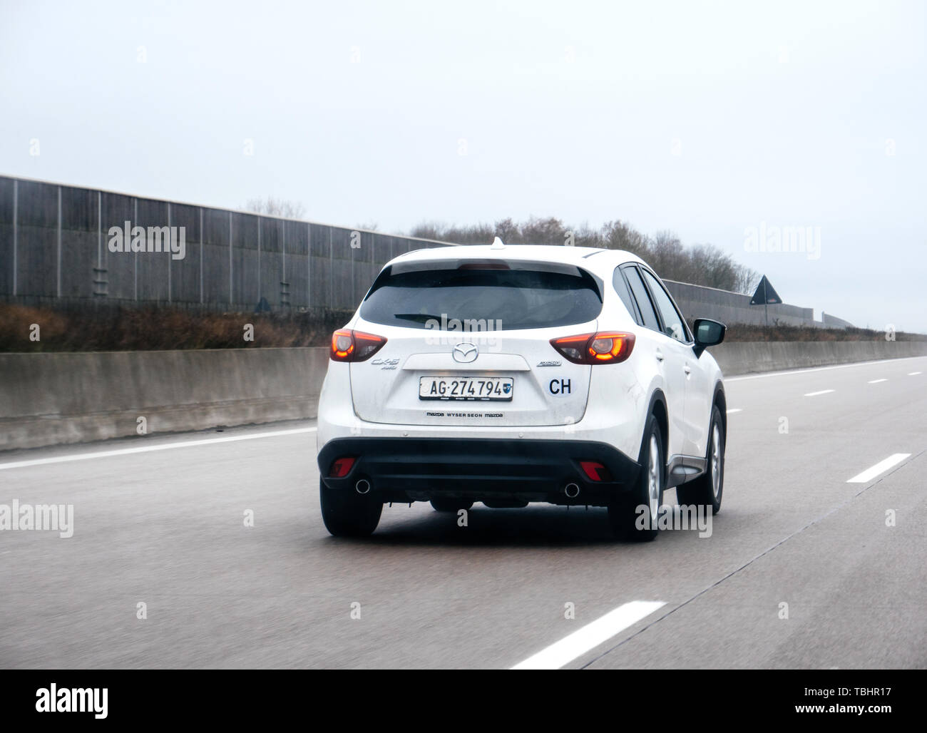 Switzerland - Feb 11, 2018: Rear view of fast white Mazda CX 5 AWD SUV  driving on swiss highway Stock Photo - Alamy