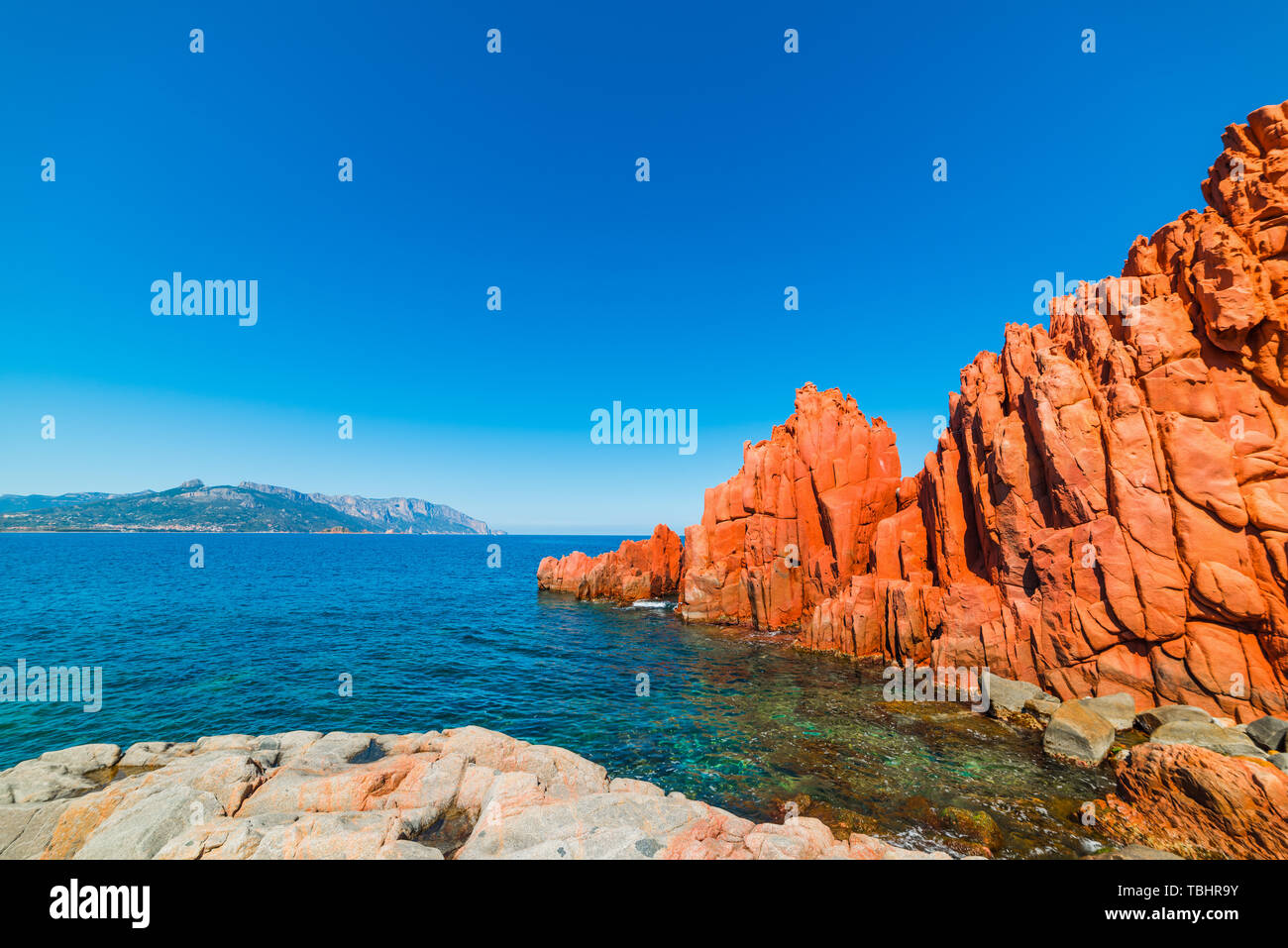 Italian Red Rocks Red rocks in Rocce Rosse beach. Sardinia, Italy Stock Photo - Alamy