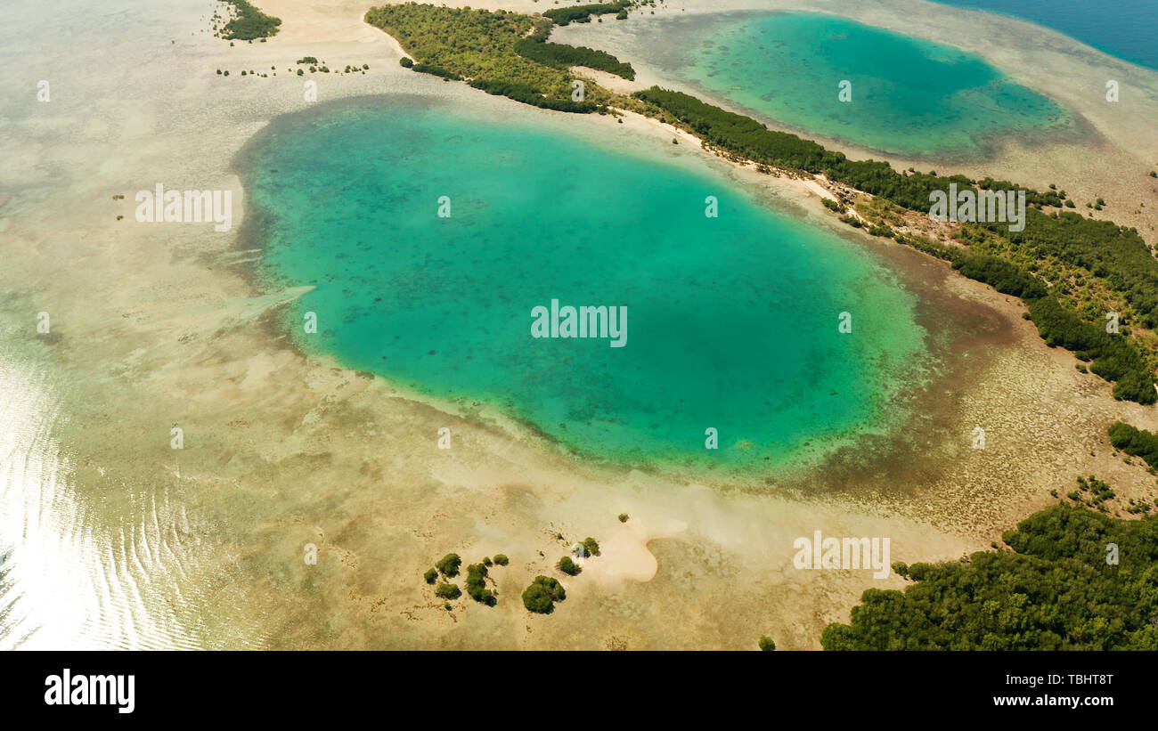 aerial view Honda bay with tropical islands and sandy beaches surrounded by coral reef with azure water, top view. Summer and travel vacation concept, Puerto princesa, Palawan, Philippines. Stock Photo