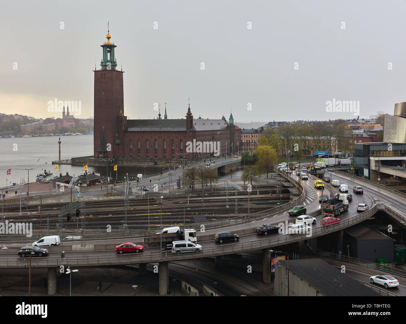 Centralbron with car traffic in front of Stockholm City Hall during a rainy day in Stockholm, Sweden Stock Photo