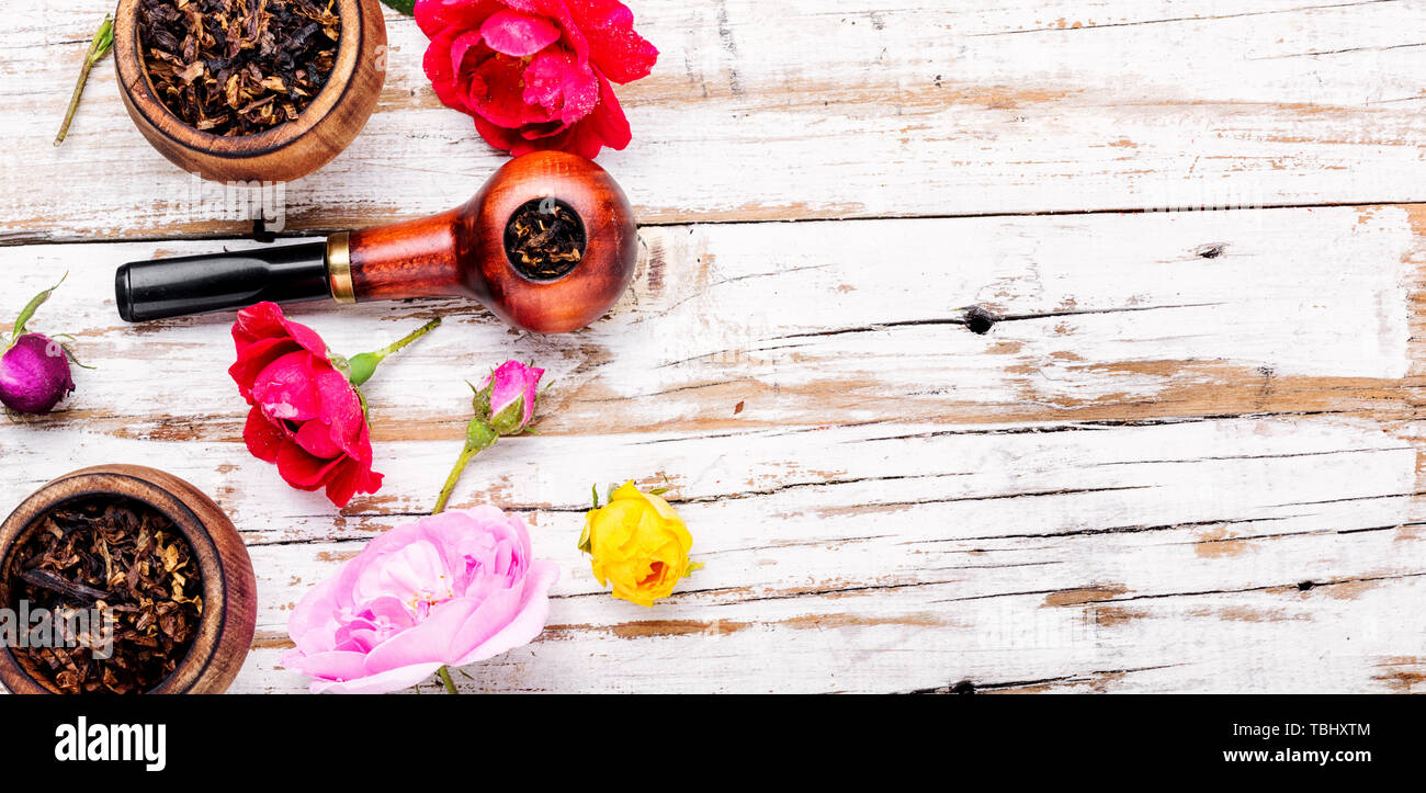 Tobacco pipe and smoking tobacco with rose flavor.Refined taste of