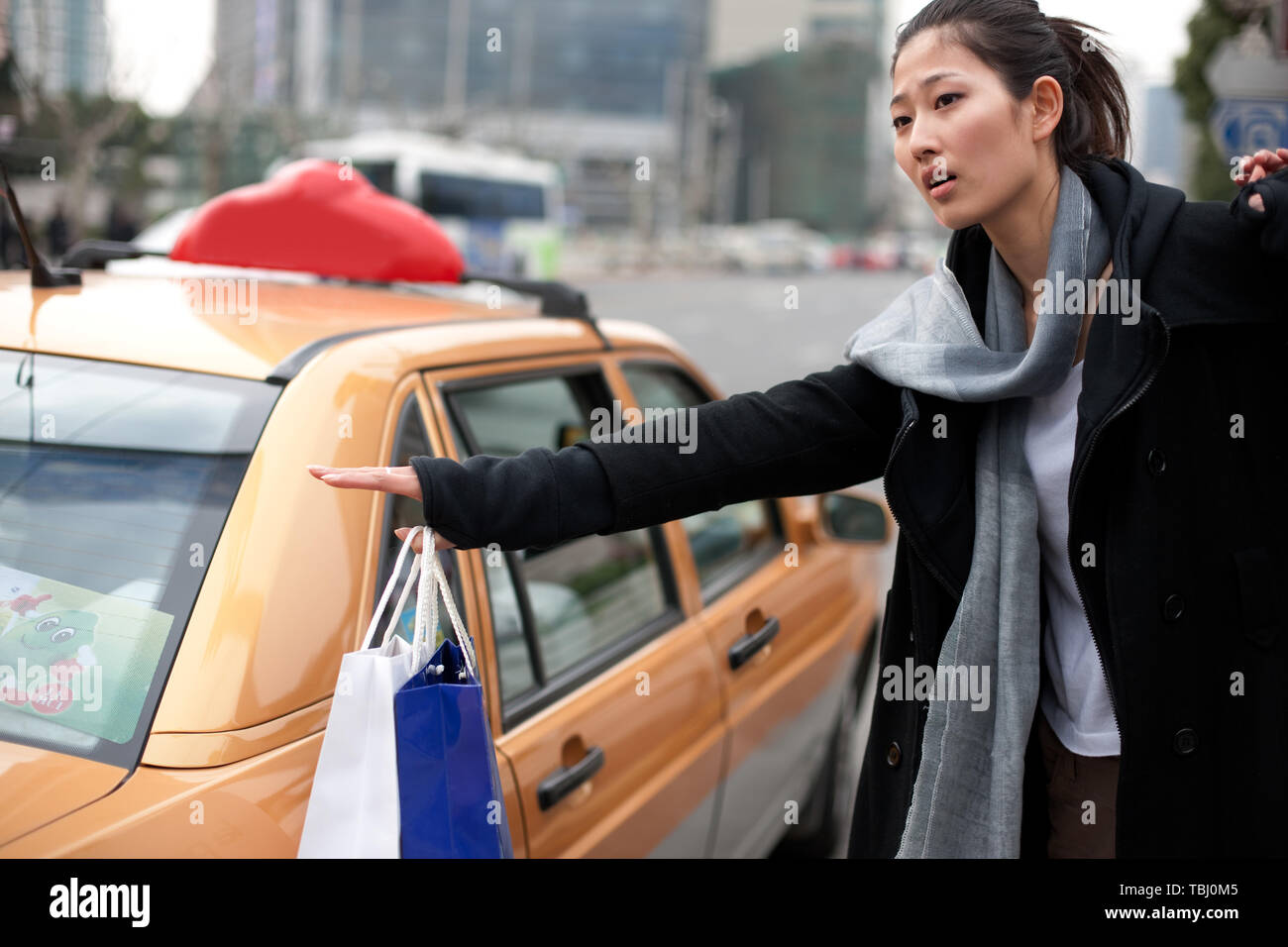 Young woman out shopping hi-res stock photography and images - Alamy