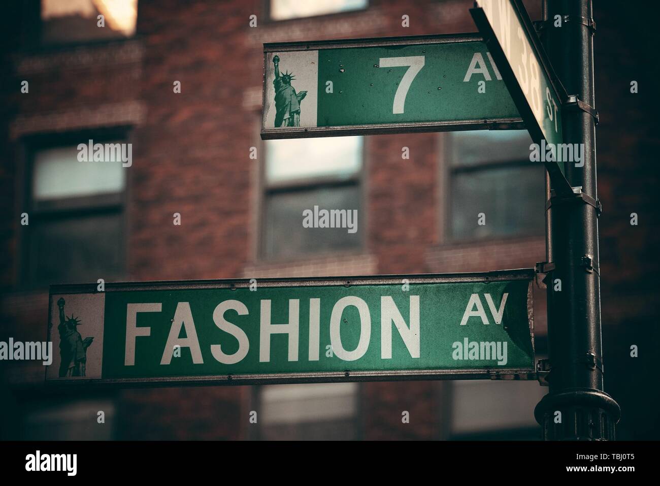 NEW YORK CITY - FEB 19: Fashion avenue street view on February 19, 2014 in Manhattan, New York City. With population of 8.4M, it is the most populous city in the United States. Stock Photo