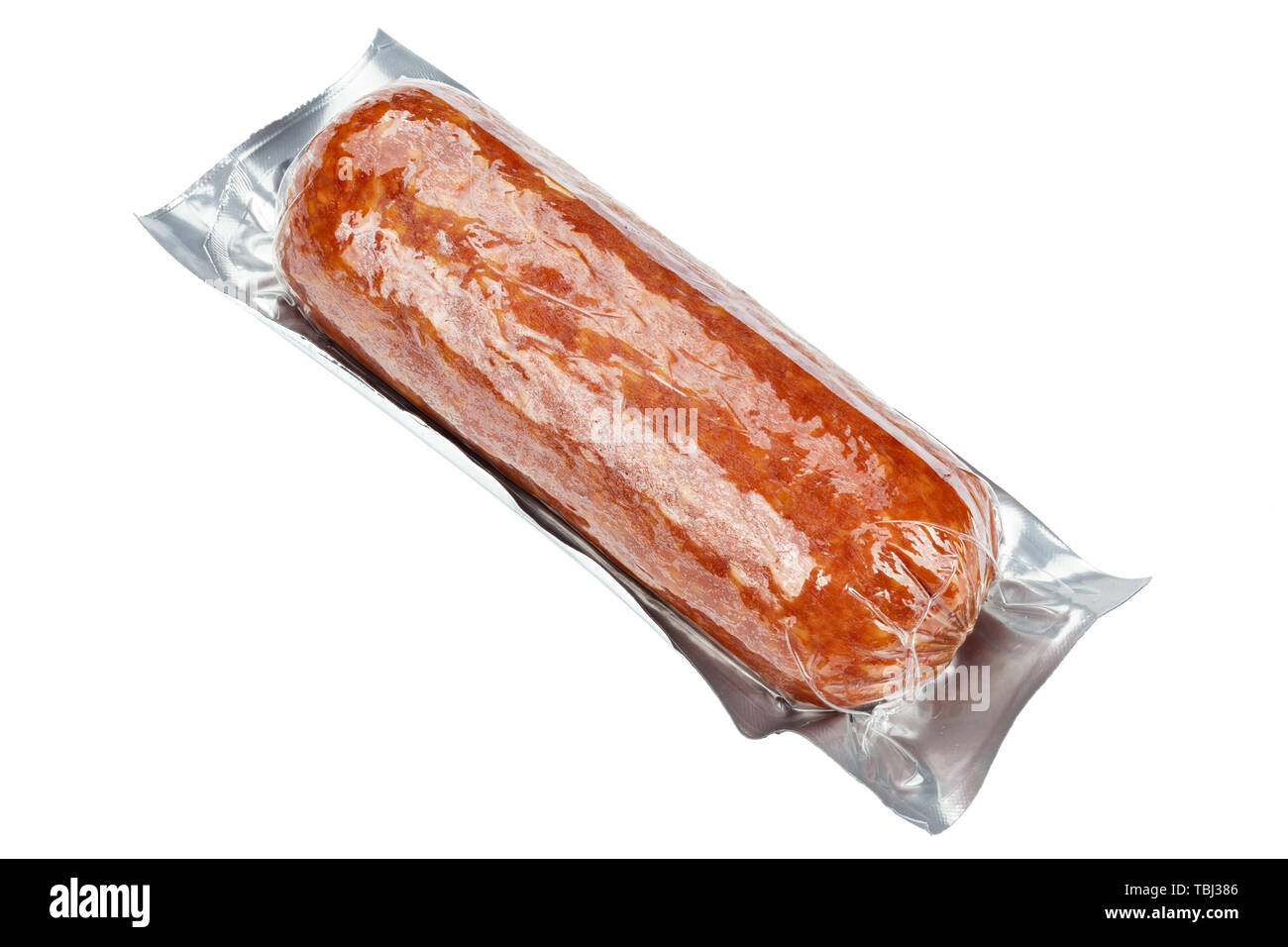 vacuum packed sausage isolated on white background. place for text. file contains clipping path Stock Photo