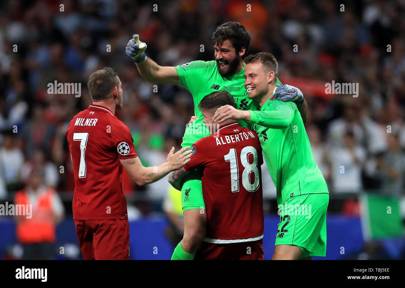 Liverpool S Left Right James Milner Alisson Becker Alberto Moreno And Simon Mignolet Celebrate After The Final Whistle During The Uefa Champions League Final At The Wanda Metropolitano Madrid Stock Photo Alamy