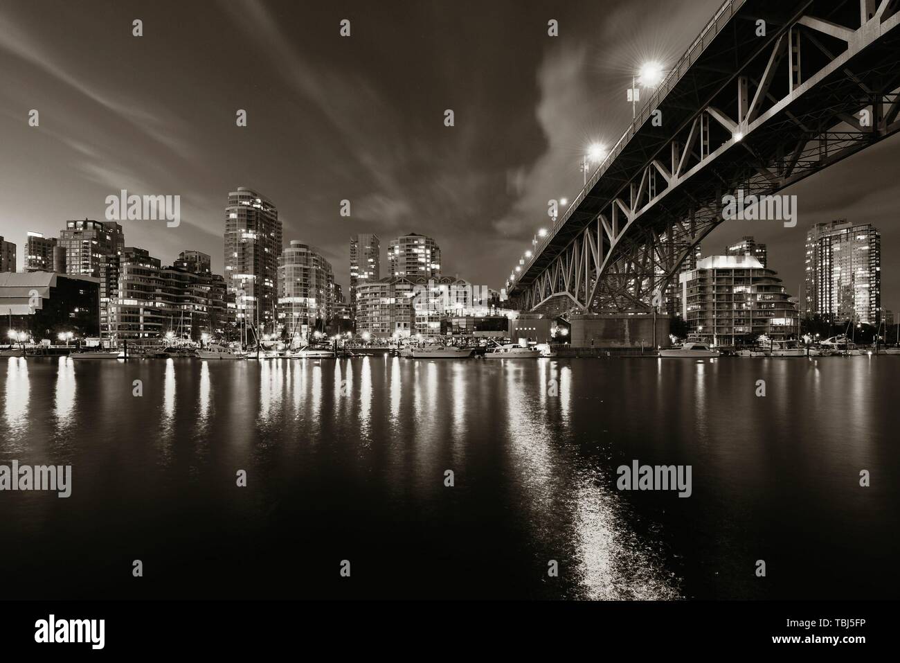 Vancouver False Creek at night with bridge and boat Stock Photo - Alamy