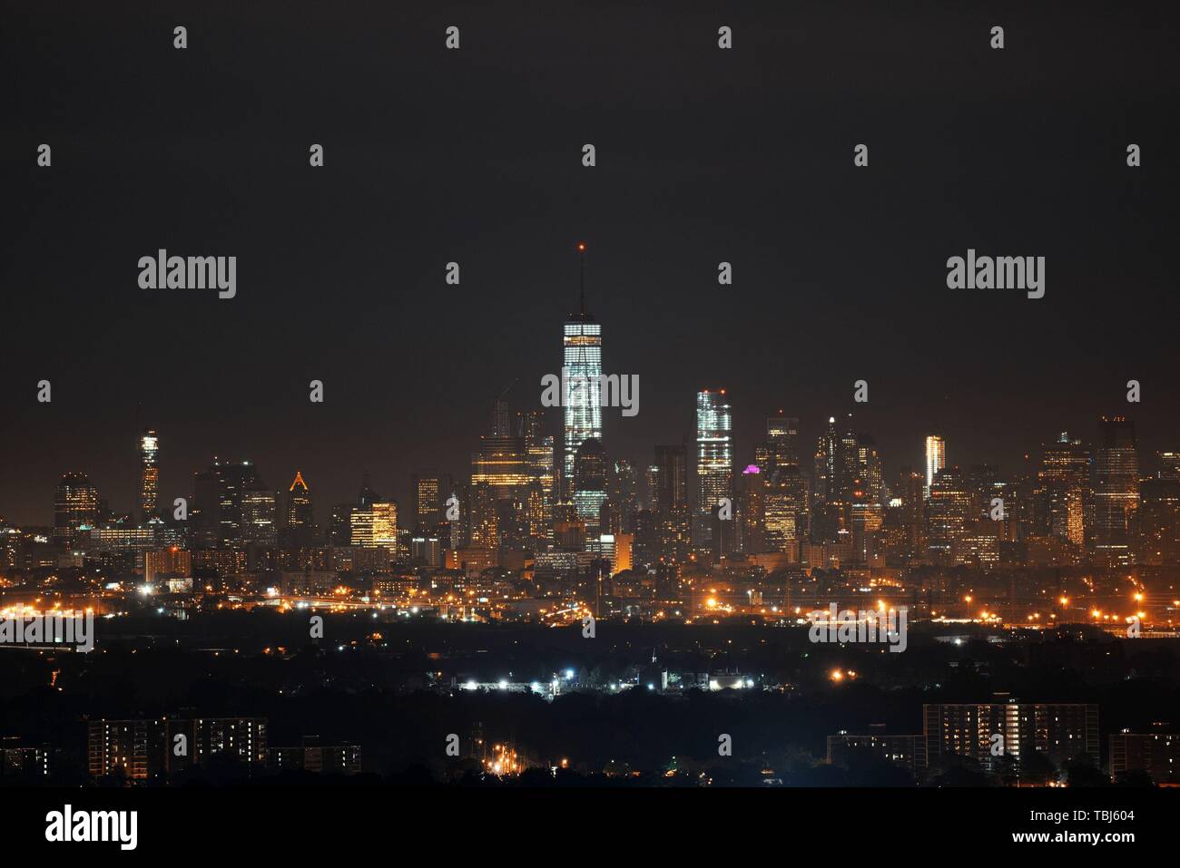 New York City downtown skyline at night Stock Photo - Alamy
