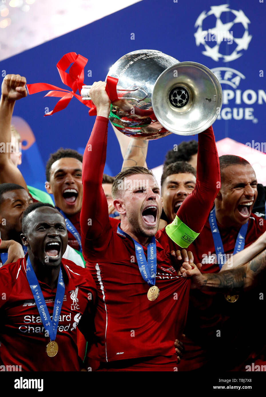 Liverpool s Jordan Henderson celebrates with the trophy after the UEFA Champions League Final at the Wanda Metropolitano Madrid Stock Photo Alamy