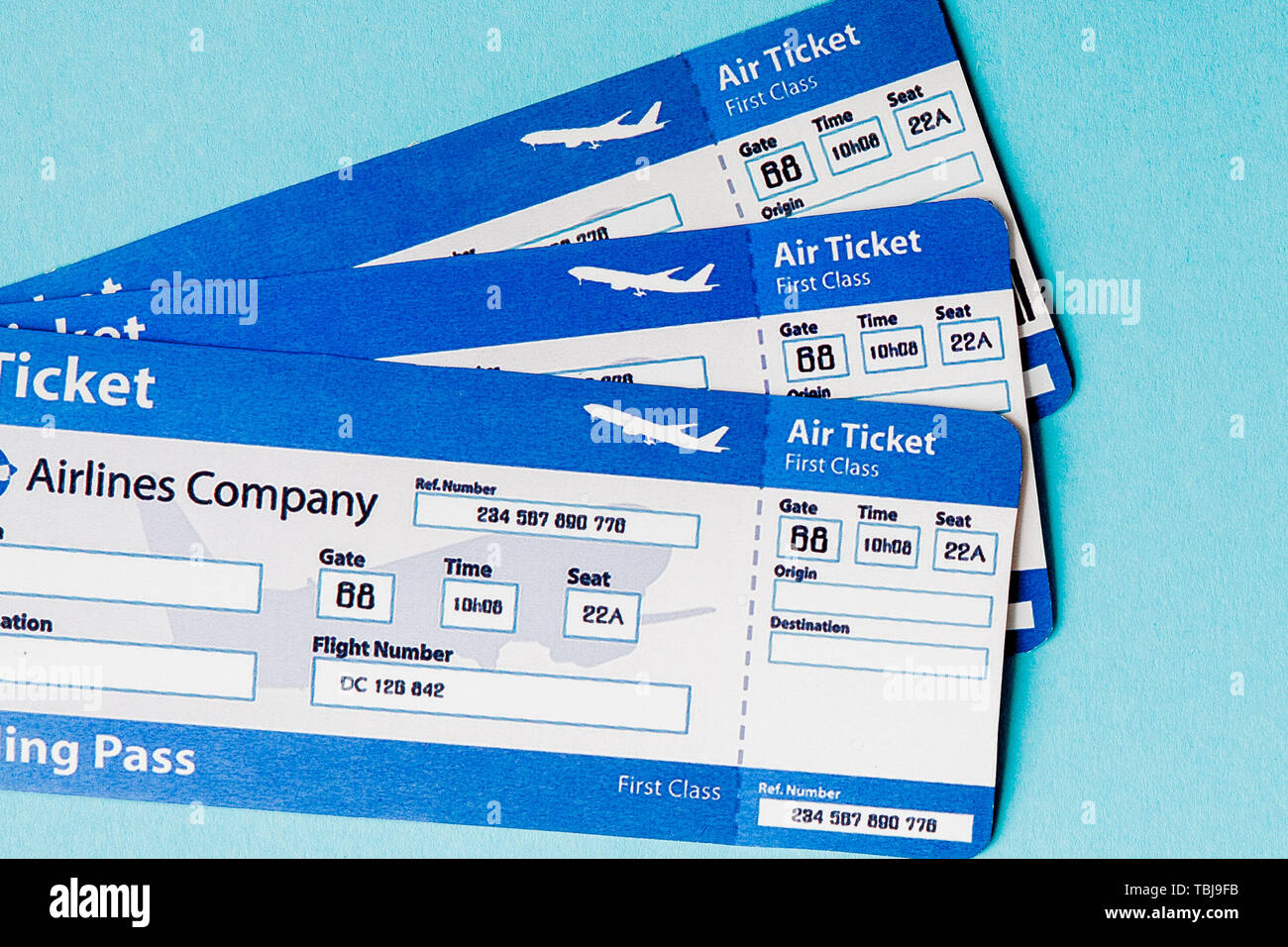Air ticket on a blue background. Travel concept, copy space Stock Photo -  Alamy
