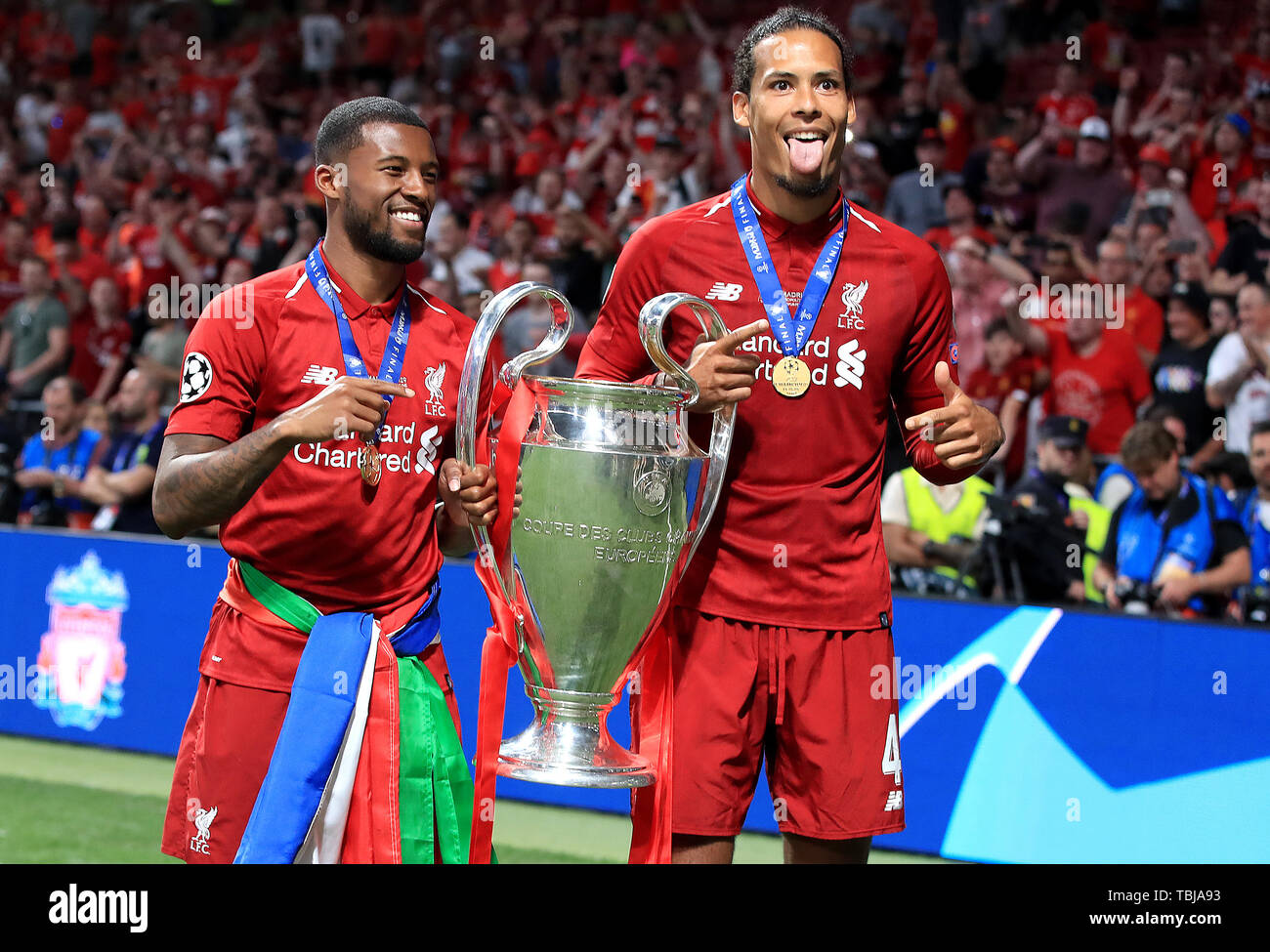 Liverpool's Georginio Wijnaldum (left) and Virgil van Dijk celebrate with  the trophy after winning the UEFA Champions League Final at the Wanda  Metropolitano, Madrid Stock Photo - Alamy