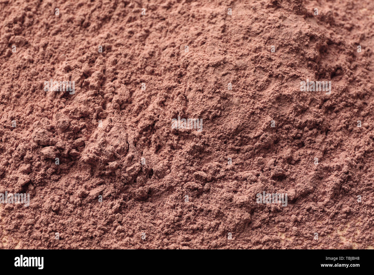 abstract of red clay soil, copper oxide contained rock in deep red