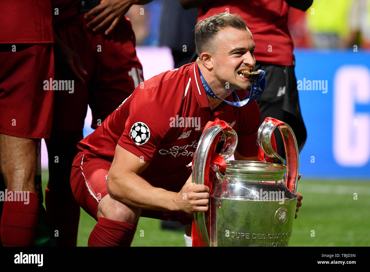 Madrid, Spain. 01st June, 2019. Liverpool's player Xherdan Shaqiri of  Liverpool FC celebrate with the trophy at the end of the during the 2019  UEFA Champions League Final match between Tottenham Hotspur