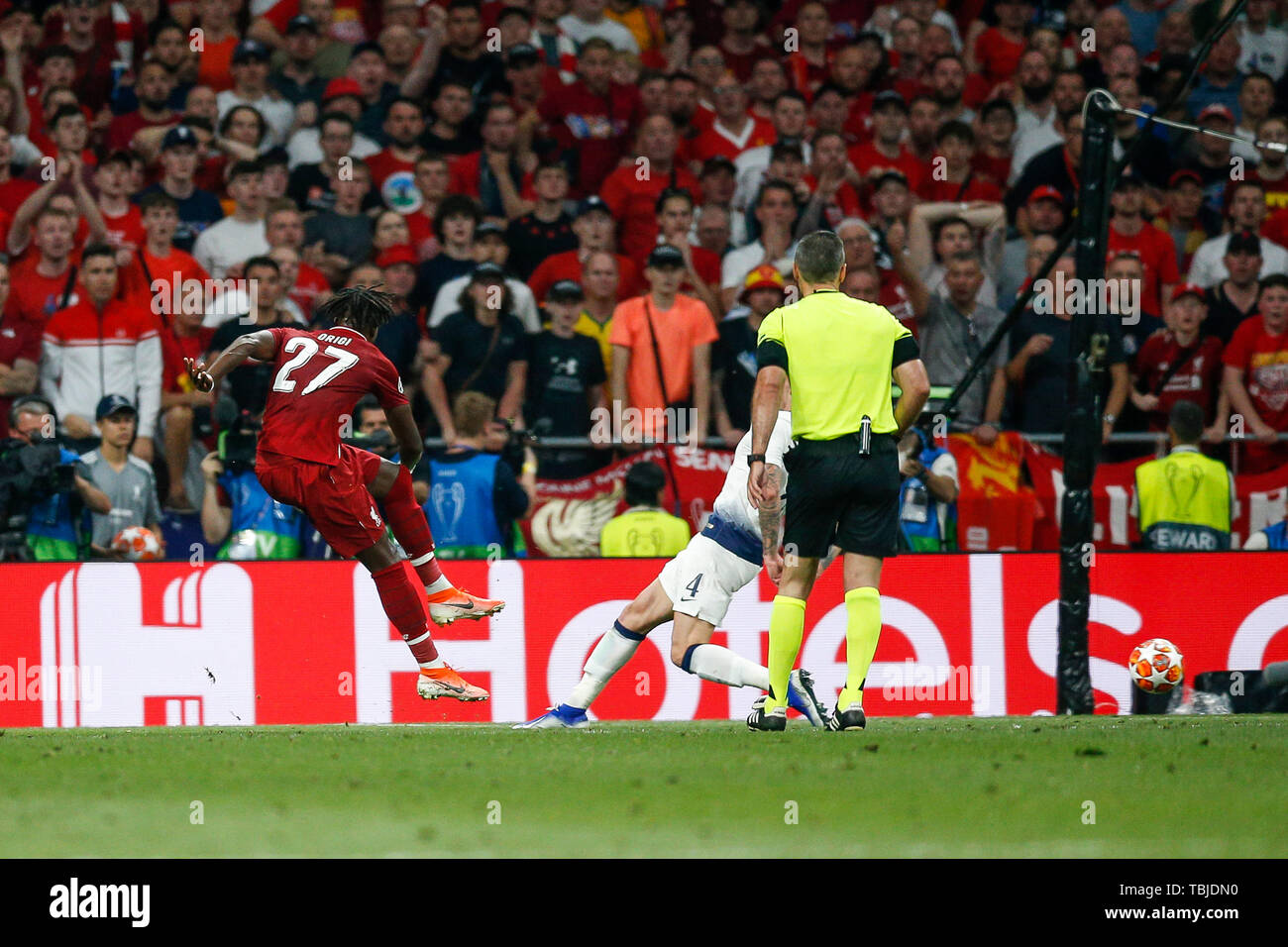 Madrid, Spain. 01st June, 2019. Divock Origi of Liverpool scores his side's  second goal to make the score 2-0 during the UEFA Champions League Final  match between Tottenham Hotspur and Liverpool at