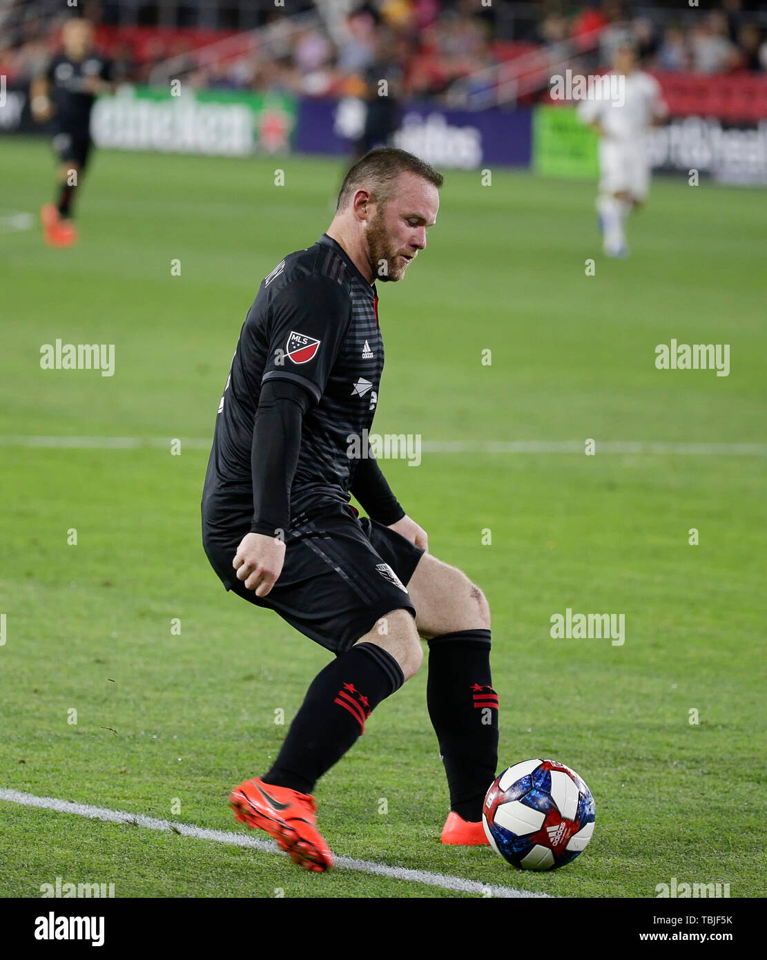 Washington DC, USA. 1st June, 2019. D.C. United Forward (9) Wayne Rooney controls the ball during an MLS soccer match between the D.C. United and the San Jose Earthquakes at Audi Field in Washington DC. Justin Cooper/CSM/Alamy Live News Stock Photo