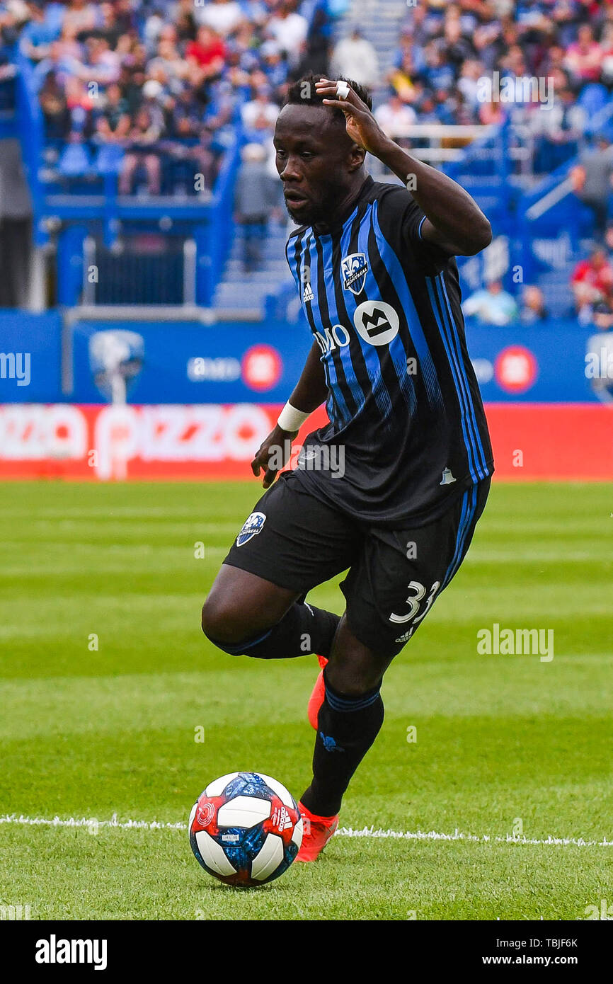 Montreal, Canada. 01st June, 2019. Montreal Impact defender Bacary Sagna (33) runs in control of the puck during Orlando City SC at Montreal Impact game at Saputo Stadium in Montreal, Canada. David Kirouac/CSM/Alamy Live News Stock Photo