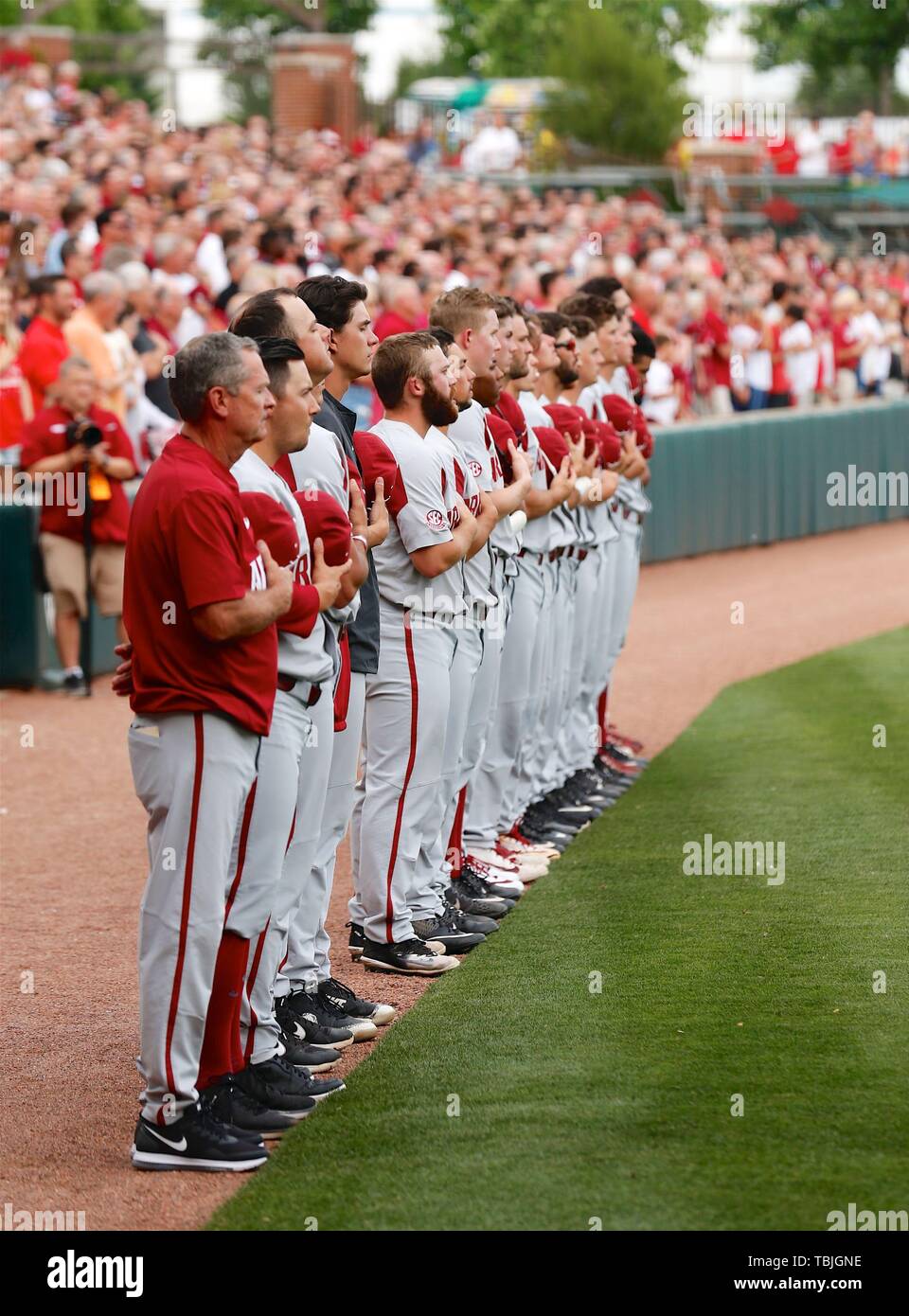 June 1, 2019: The Arkansas Razorback baseball team lines up along third base for the National Anthem. Arkansas defeated TCU 3-1 in Fayetteville, AR, Richey Miller/CSM Stock Photo