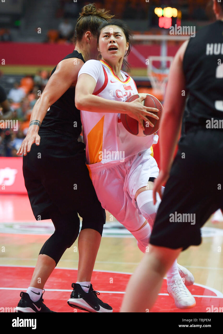 Haian, China's Jiangsu Province. 2nd June, 2019. Wang Siyu (C) of China vies for the ball during the 2019 International Women's Basketball Challenge between China and Canadian-American Women All-Stars Team in Haian, east China's Jiangsu Province, June 2, 2019. China won 92-85. Credit: Ji Chunpeng/Xinhua/Alamy Live News Stock Photo