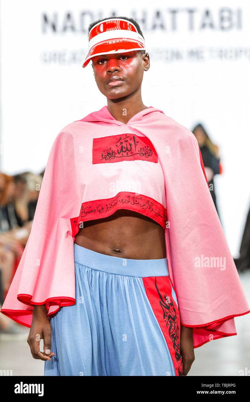 London, UK, 02 June 2019. A model walks the runway in a design by Nadia Hattabi, Greater Brighton Metropolitain College. Graduate Fashion week is held at the Old Truman Brewery, and a showcase and springboard for new talent from British fashion schools to the international fashion industry. Stock Photo