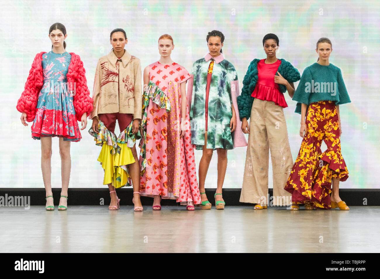 London, UK, 02 June 2019.  Models on the runway in designs by Kirsty Taylor, Greater Brighton Metropolitan College.   Graduate Fashion week is held at the Old Truman Brewery, and a showcase and springboard for new talent from British fashion schools to the international fashion industry. Stock Photo