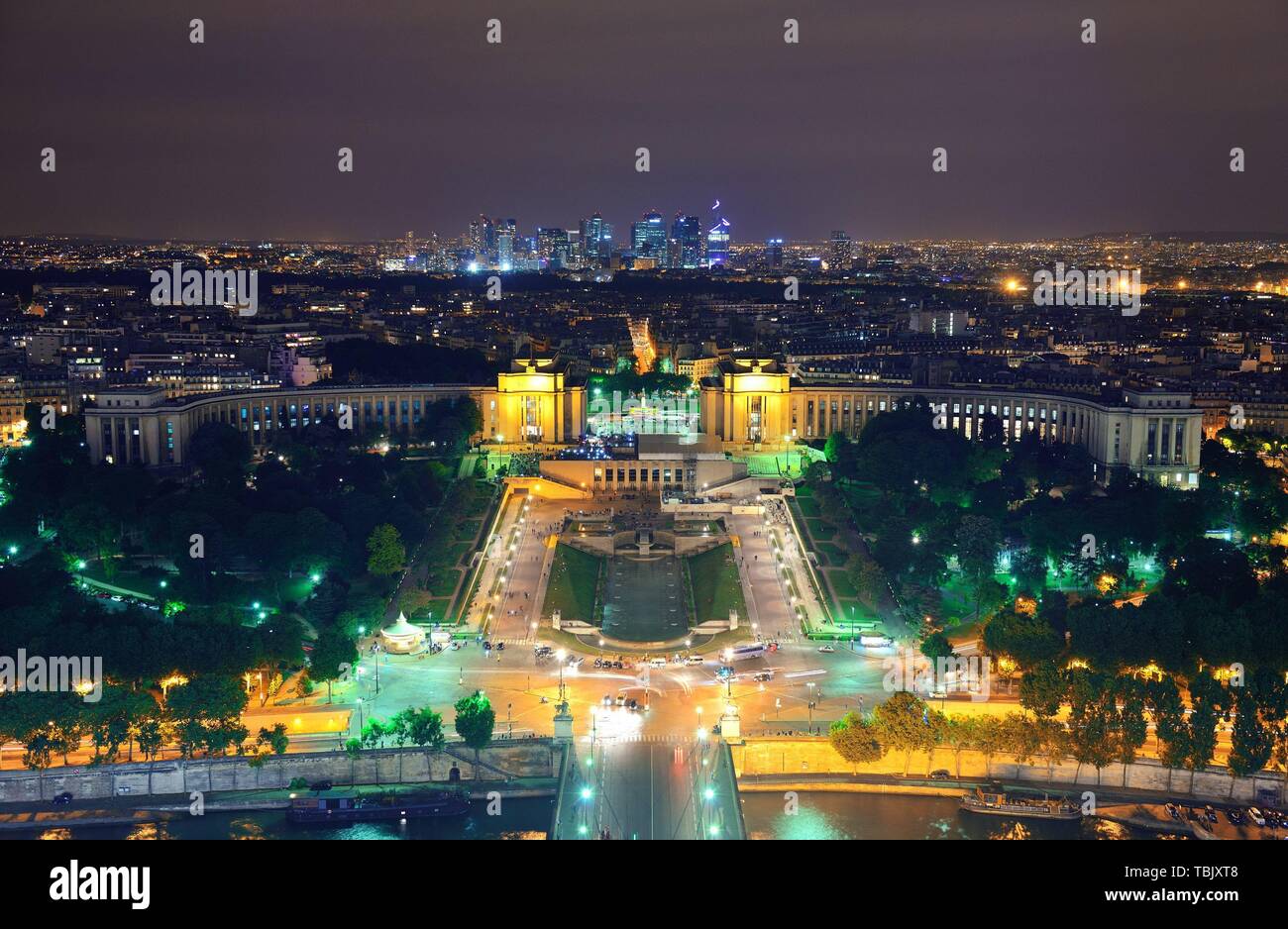 Paris city skyline rooftop view with la Defense at night, France Stock