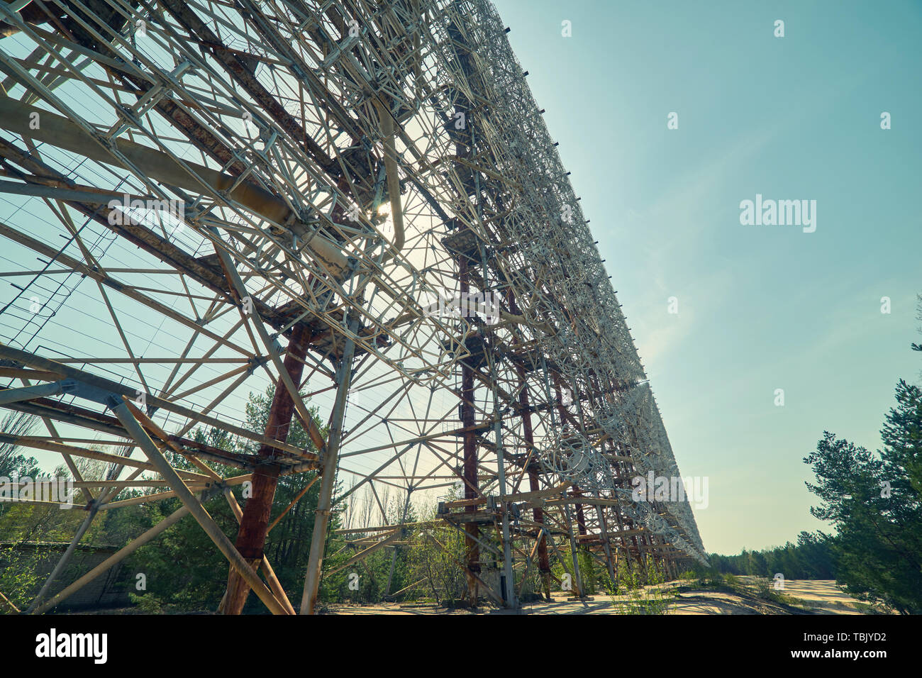 Telecommunication radio center in Pripyat, Chernobyl area known as the Arc  or Duga and so called Russian woodpecker with blue sky and clouds on backgr  Stock Photo - Alamy