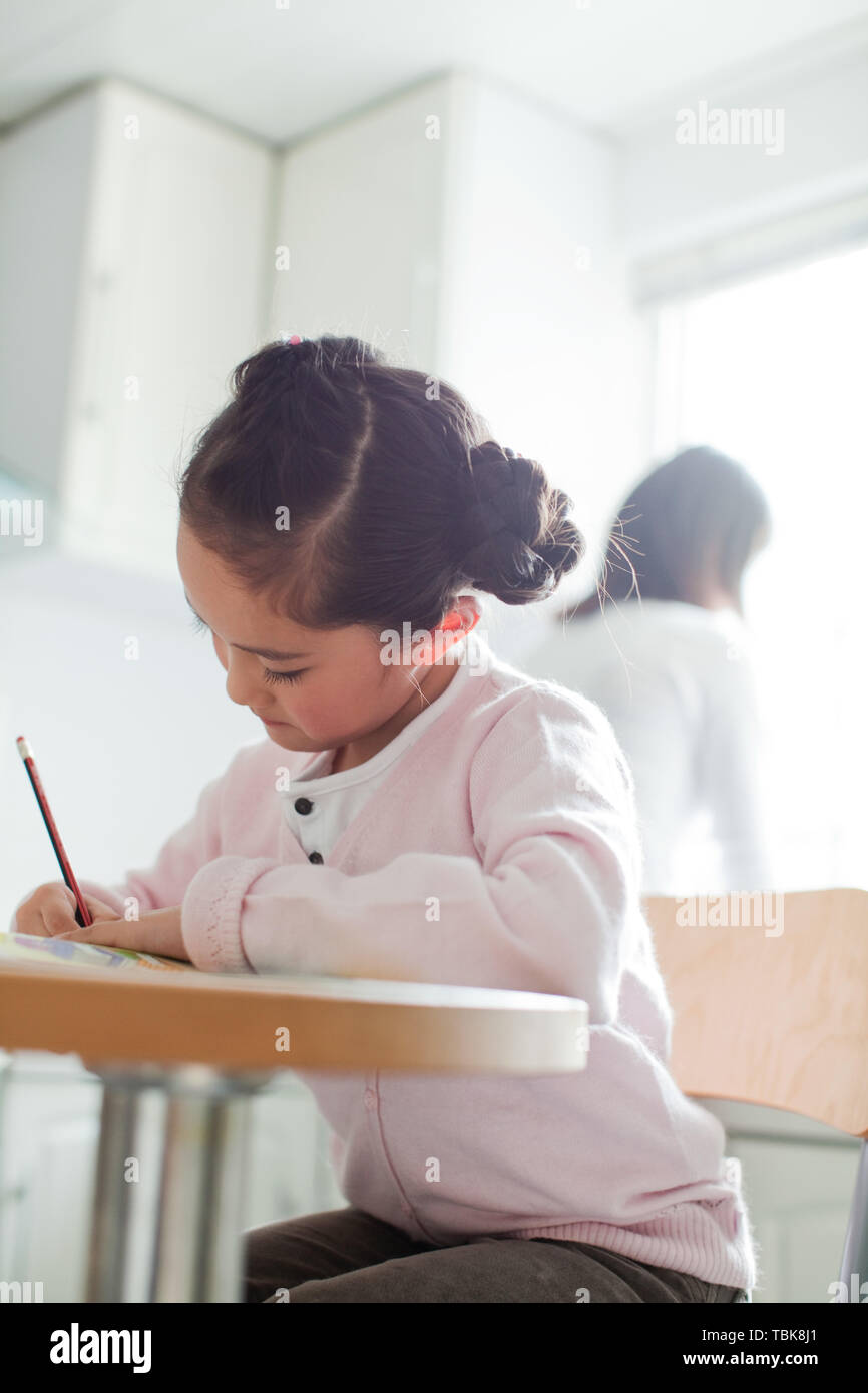 A child is studying. Stock Photo