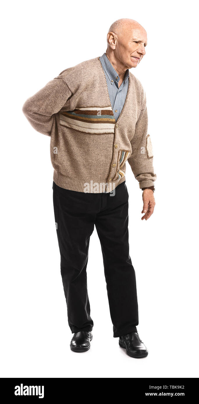 Senior man suffering from back pain on white background Stock Photo - Alamy