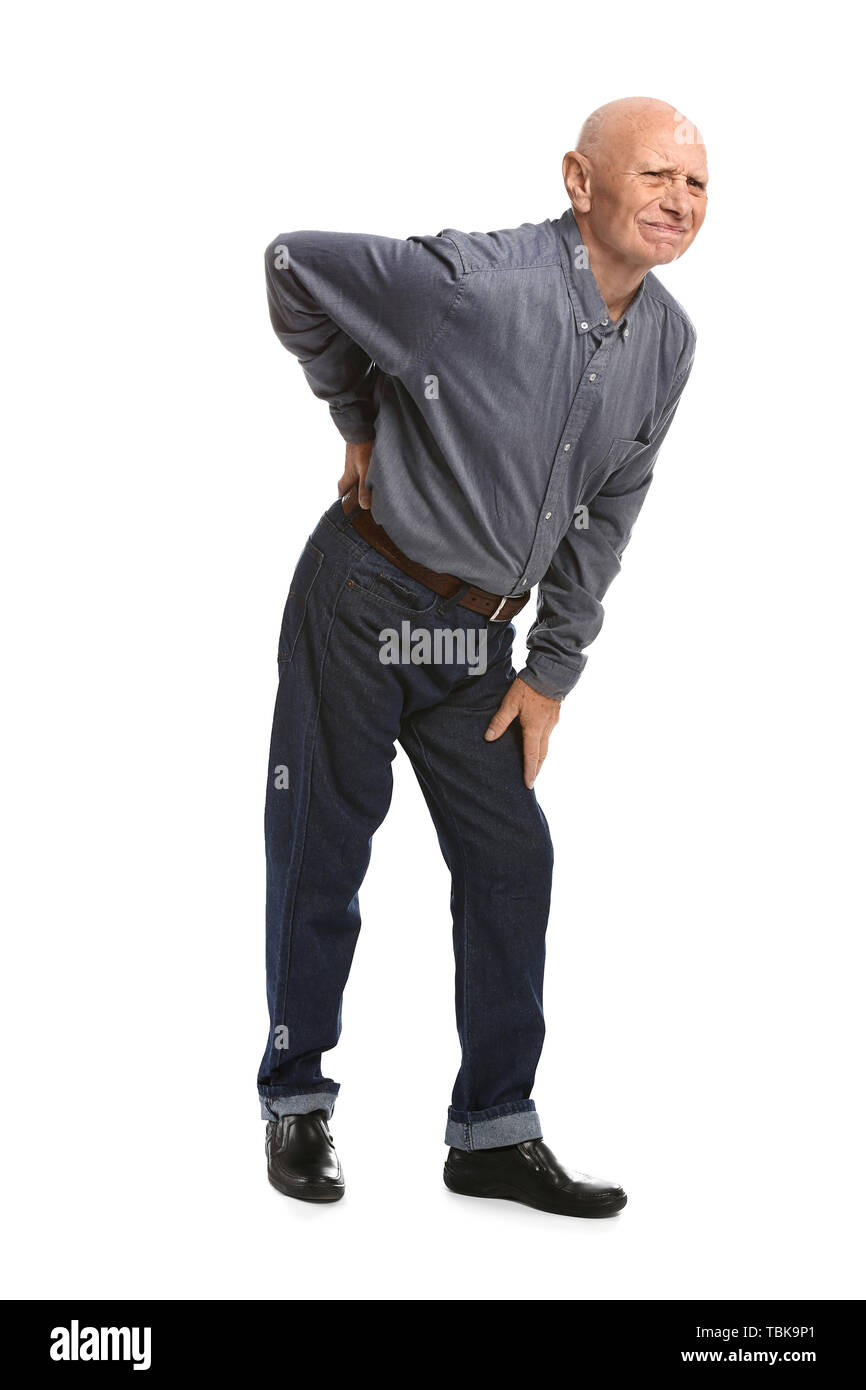 Senior man suffering from back pain on white background Stock Photo - Alamy