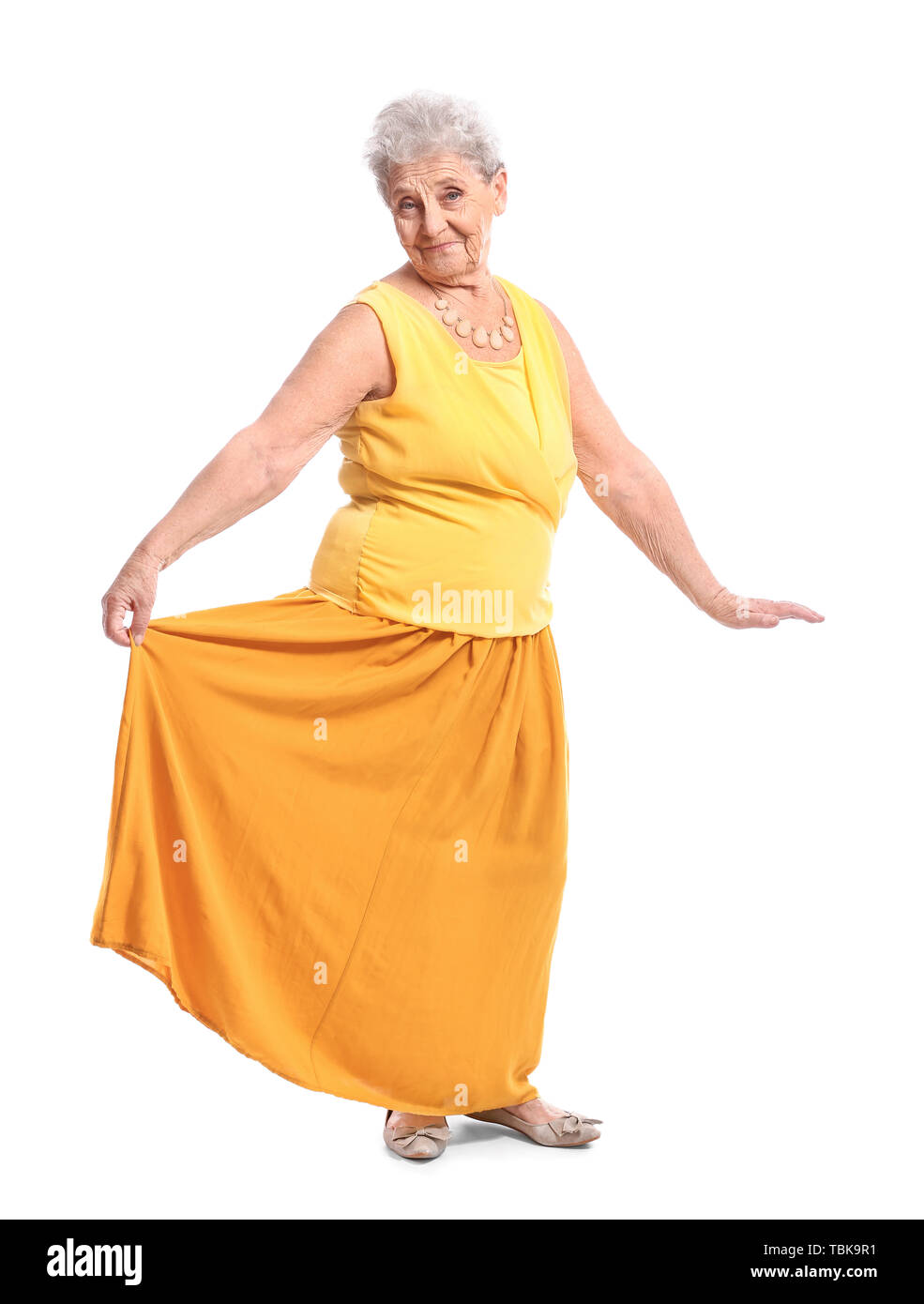 Portrait of senior woman on white background Stock Photo - Alamy