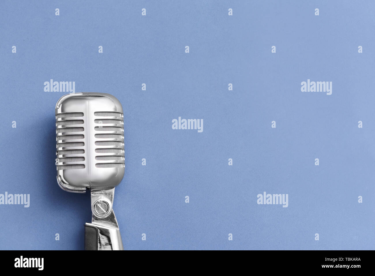 Retro microphone on grey background Stock Photo Alamy