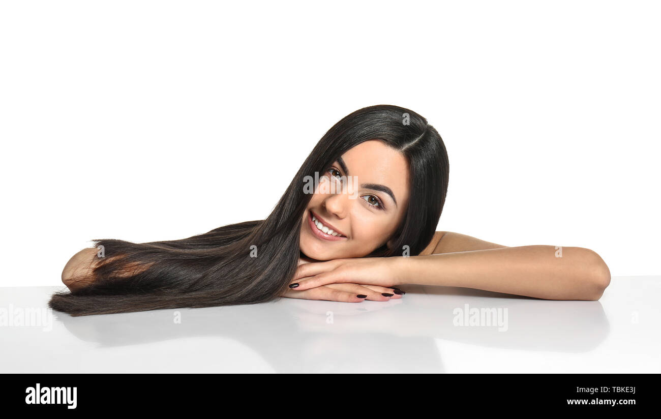 Portrait of beautiful young woman with healthy long hair on white ...