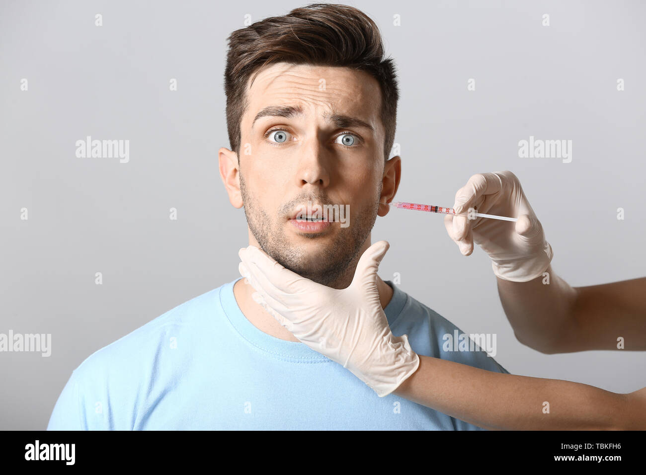 Man scared hands face hi-res stock photography and images - Alamy