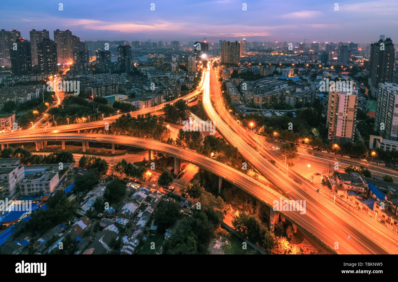 Hefei Yuxi Road overpass, shaped like a big triangle, from Dadong Road in the east and Binhe Road in the west, the total length is about 1.1 kilometers, 60 meters wide, two-way eight lanes, the project construction content includes Heyu Road overpass, Binhe Road pedestrian flyover and viaduct main body, is one of the nine overpasses in Hefei. Stock Photo