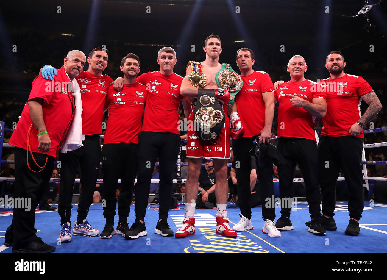 Callum Smith (centre) celebrates his win in the WBA 'Super' World, WBC  Diamond, Ring Magazine fight with brothers Liam Smith (centre left) and Paul  Smith (right) and training team at Madison Square
